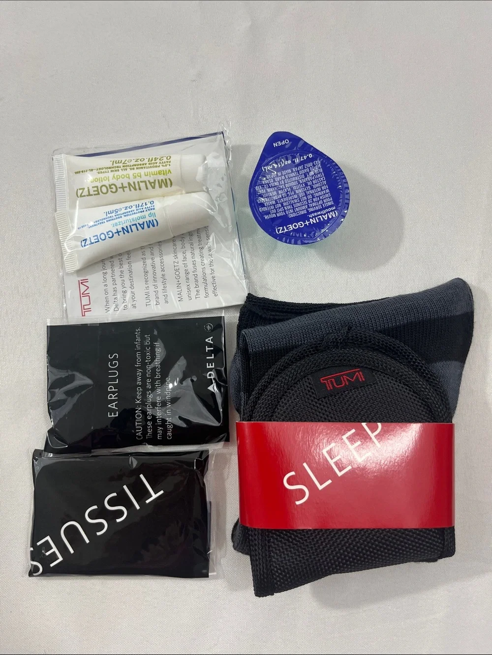 Tumi Accessory/Travel Case - Black - with Travel Samples - new with flaw